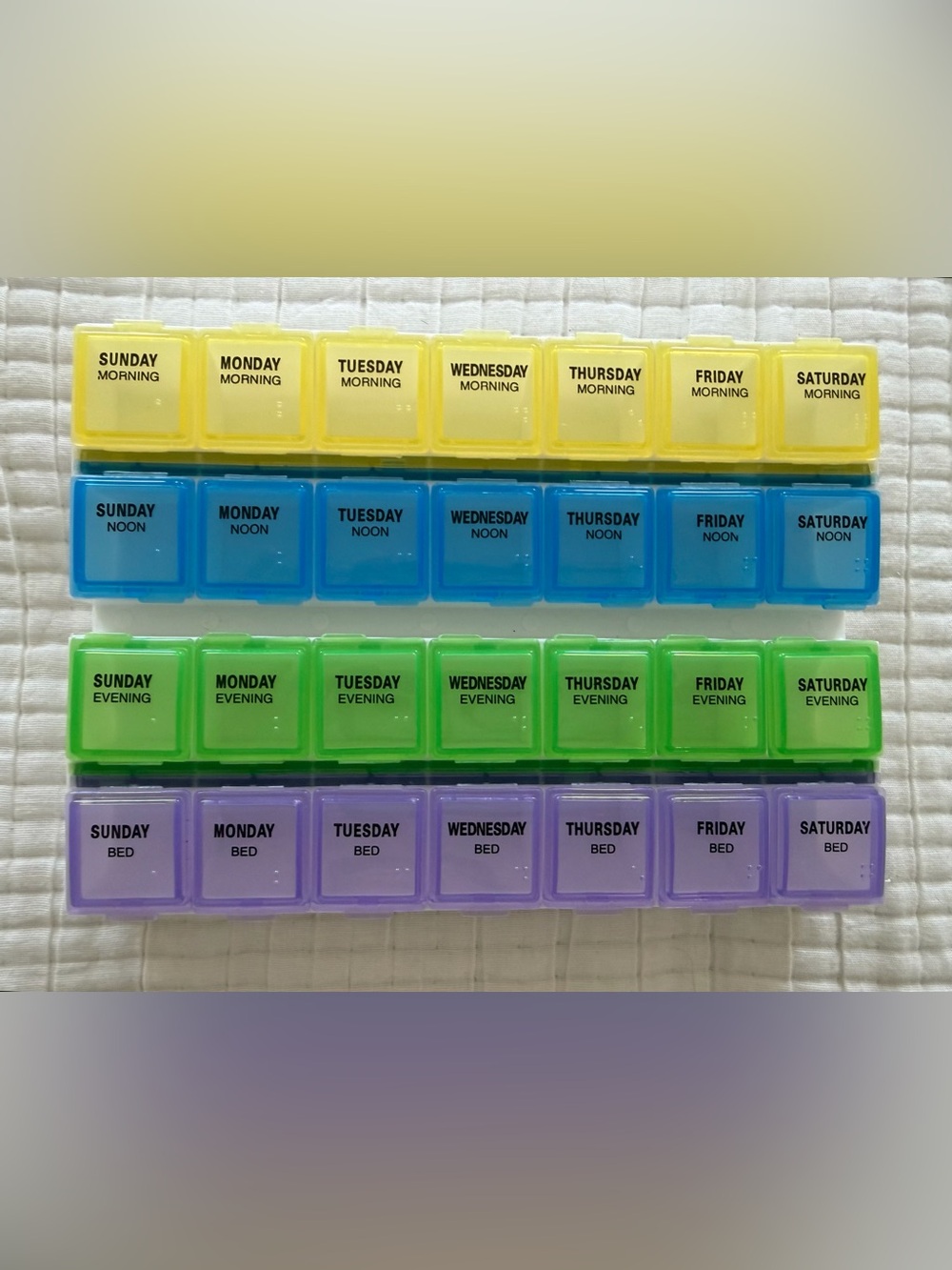 Weekly pill organizer for morning, noon, evening, bed